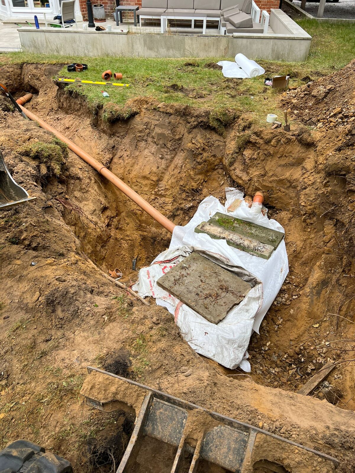Drainage excavation with pipework