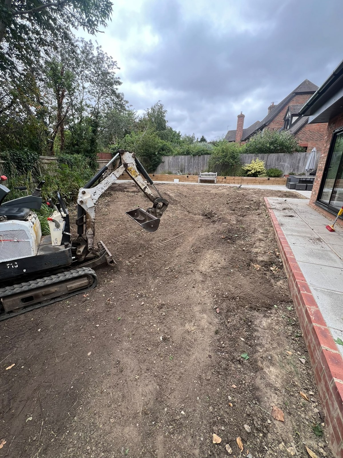 Same garden cleared and levelled to bare soil